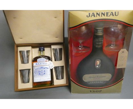 Two presentation boxes, one with a 68cl bottle Janneau VSOP Grand Armangnac with two glasses and the other with a 11 1/2 fl. 