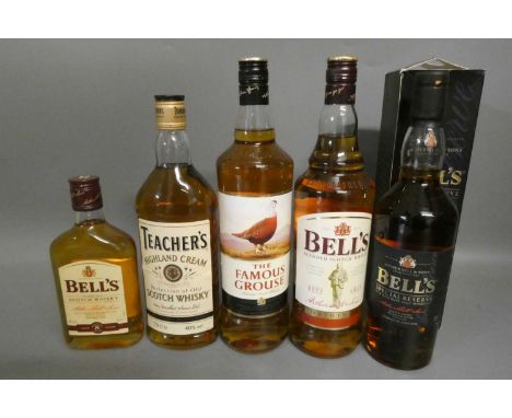 Five bottles of blended scotch whisky, comprising a boxed 70cl Bell's special reserve, a 70cl Bell's Original, a 35cl Bell's 