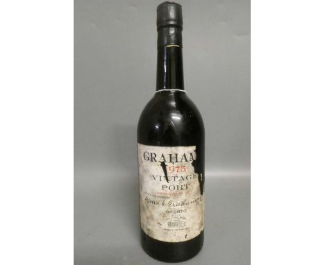 One bottle Graham's 1975 vintage port (Est. plus 24% premium inc. VAT)Condition Report: Level top of shoulders, loss to label