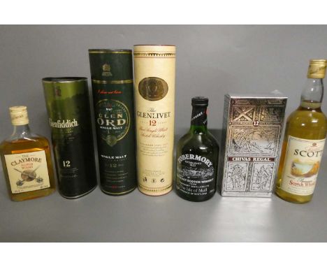 Seven bottles of Scotch whisky, comprising 12yr old Glen Org in tube, 12yr old Glenlivet in tube, a Lawrence Scott premium wh