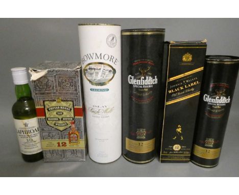 Six bottles of Scotch whisky, comprising a 70cl Bowmore Legend in tube, a 70cl Glenfiddich 12yr old special reserve in tube, 