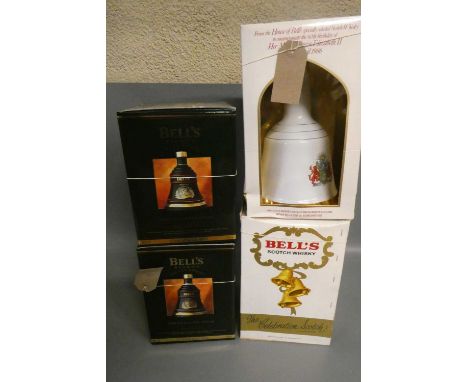 Four boxed Bell's whisky decanters, comprising two 70cl Christmas decanters for 1993 and 1992, a 75cl 60th birthday of Queen 