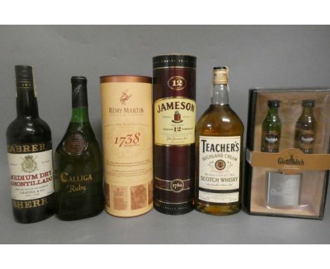 Five bottles of mixed spirits &amp; Liqueur, comprising a boxed Jameson 12yr old whiskey, a Teacher's Highland Cream whisky, 