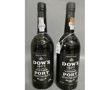 Two bottles Warre's 1977 vintage port (Est. plus 24% premium inc. VAT)Condition Report: Minor label issues, levels in neck, C