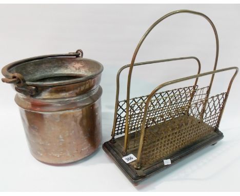 Brass wire mesh two section magazine rack upon rectangular ebonised stand, together with a copper plated swing handled bucket