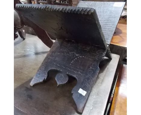 An Eastern folding carved Koran stand.