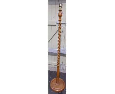 Oak barley twist turned standard lamp.
