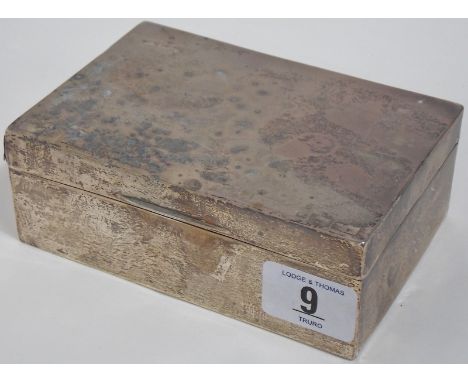 Silver cigarette box of rectangular form, lid with engine turned decoration, width 5', Birmingham 1930.  