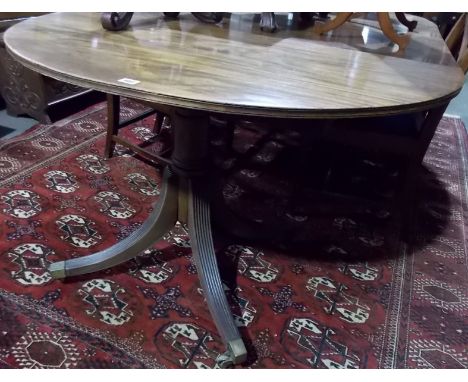 19th Century mahogany D-end twin pedestal dining table with two extra leaves, the ring turned pedestals with four outswept re