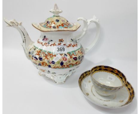 19th Century porcelain wrythen moulded tea bowl and saucer with gilded highlights upon a dark blue ground, together with a Vi