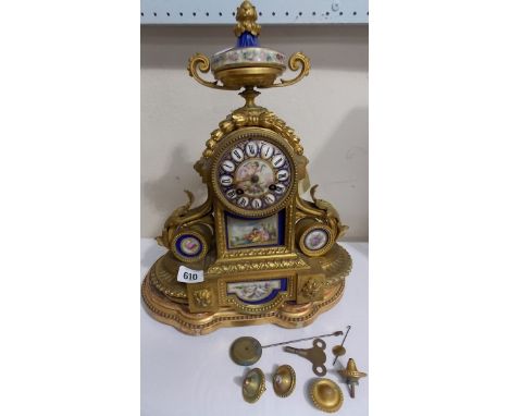 19th Century French ormolu and porcelain two train mantel clock, the movement striking on a bell, the porcelain dial painted 