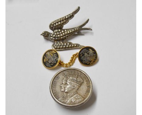 Silver brooch in the form of a swift, a Japanese yellow metal shakudo cufflink and a George VI button (3)