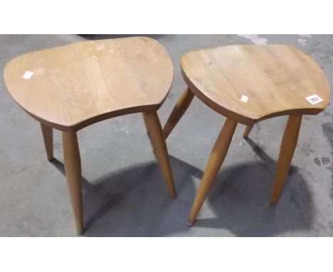 Pair of Ercol pale elm stools.