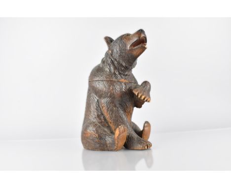 A 19th Century Carved Black Forest Bear Tobacco Jar/Caddy, Modelled Seated with One Paw Raised, the Head and Shoulders Formin