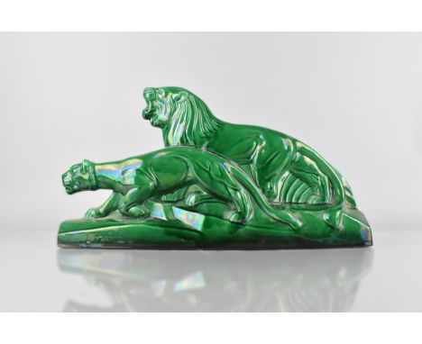 An Art Deco Green Luster Ceramic Study pf Lions on Rectangular Base After L. François,