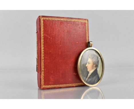 A 19th Century Cased Oval Portrait Miniature of a Young Gentleman, 4.5cmx3.75, House in Fitted Red Leather Case. 