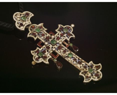 An Austro-Hungarian enamel and gem set cross,of ornate fleuree form with open square aureole. Pierced and enamelled cross bar