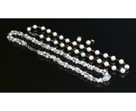 A cased single row cultured freshwater pearl necklace,by Cellini, with graduated faceted garnet and faceted smokey quartz bea