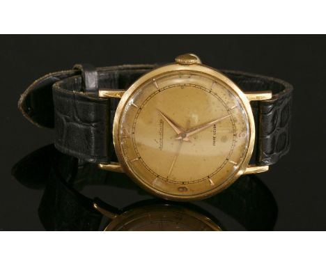 A gentlemen's 18ct gold Jaeger-LeCoultre mechanical 'Favre Leuba' strap watch,the case, 35mm diameter, with a champagne dial,