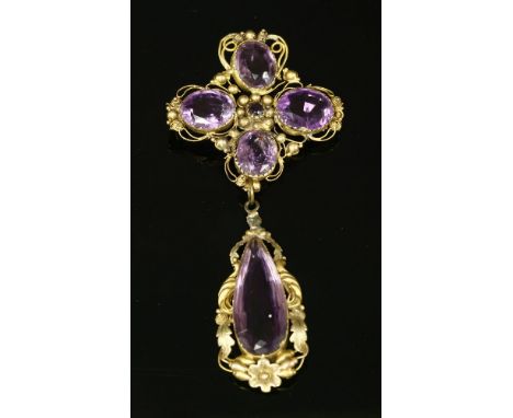 A Regency gold cannetille amethyst brooch with a pendant drop below,a cruciform top section with a circular Swiss cut amethys