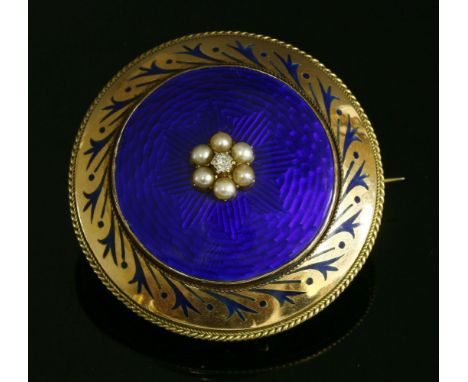 A Victorian diamond, split pearl and enamel, circular shield form brooch, c.1850,with a circular shallow boss to the centre. 