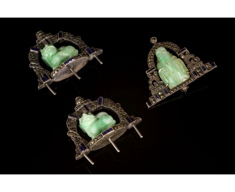 A pair of silver Art Deco jade, synthetic sapphire and marcasite mounts or handles, c.1930,each with a carved jade Fu dog wit