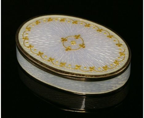 A silver gilt enamel box,by David Anderson, of oval hinged form, white guilloché enamel decoration to a sunburst ground, with