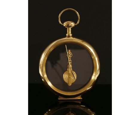 A Jaeger-LeCoultre brass and glass cased desk clock, modelled in the form of a pocket watch, with a sixteen jewel skeleton mo