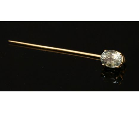 A single stone green sapphire gold stickpin,four claw set to a plain collet.  Approximately 2.00ct, 1.54g.  A box by Mappin &