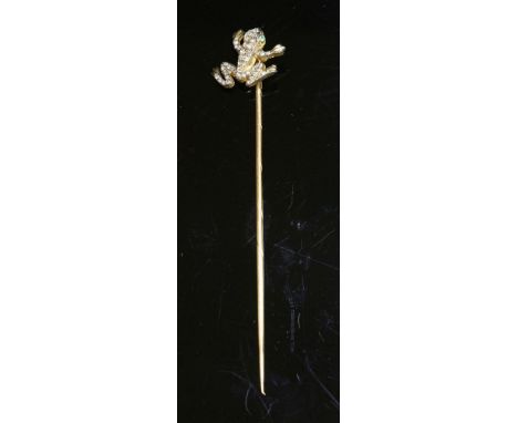 A Continental gold, diamond and emerald set frog stickpin, the frog pavé set with graduated rose cut diamonds and faceted eme