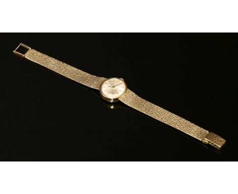 A ladies' 9ct gold Eternamatic 'Sahida' mechanical bracelet watch,with a circular case, 20mm diameter.  Silvered dial with gi