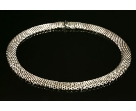 A sterling silver Tiffany 'Somerset' necklace,12mm wide with a concealed box clasp, with hinged safety bars.  Signed 'Tiffany