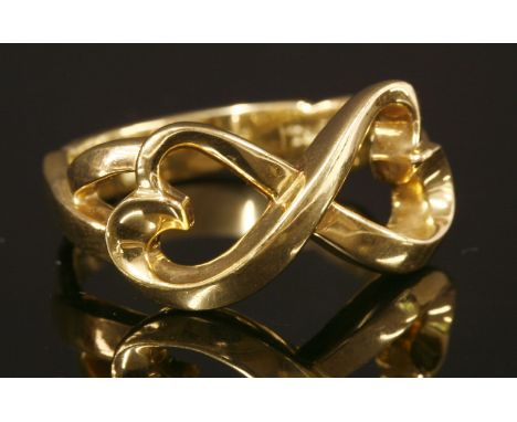 A gold 'Double Loving Heart' ring, by Tiffany, designed by Paloma Picasso, with open hearts in a landscape position to open c