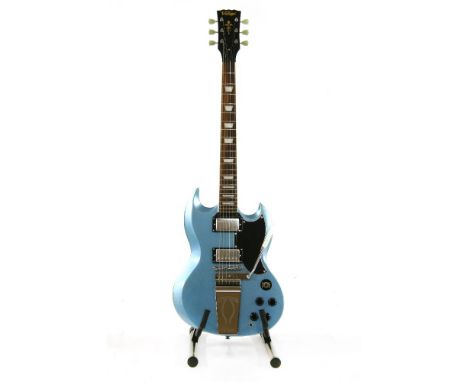 A Vintage SG style guitar, with fitted hard case