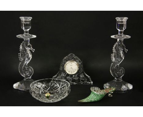 A pair of Waterford crystal candlesticks, a bowl, a glass slipper and Stuart crystal mantle clock