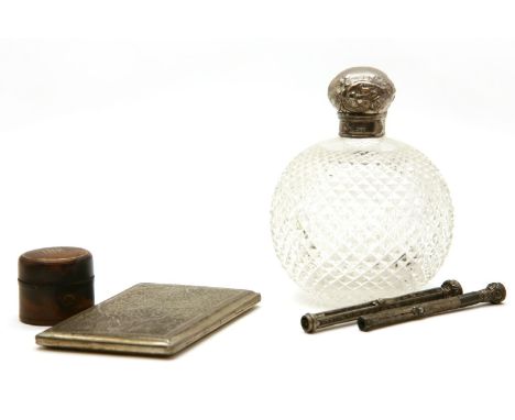 A silver cigarette case, together with two silver propelling pens, a silver topped cut glass scent bottle and a travelling in