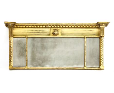 A large overmantel mirror, with boar's head motif, rope twist supports to either end, 170cm wide, 75cm high