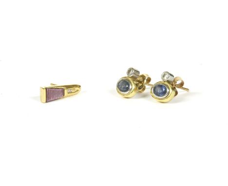 A pair of 18ct gold diamond and sapphire stud earrings, a rub set diamond to an oval cut sapphire in a yellow collet, 2.33g, 