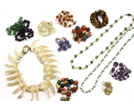 A collection of gemstone necklaces, to include a single row graduated amethyst and rock crystal bead necklace, a single row g