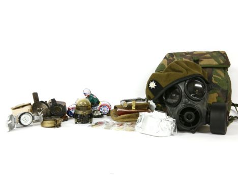 A presentation engine section from a Rolls Royce Merlin Hurricane, 1940, 11cm wide, together with a collection of compasses, 