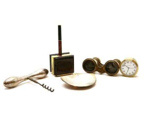 A Tiffany brass cased desk clock, 5cm diameter, together with a Gucci desk pen and holder, a pair of opera glasses, a corkscr