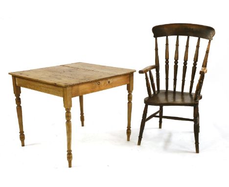 A Victorian pine square table, on ring turned legs, 84cm wide, 84cm deep, 70cm high, together with a stick back armchair, on 