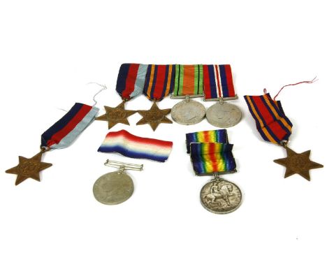 A First World War British war medal awarded to Private H. V. Warren, together with a second world war group of four medals an