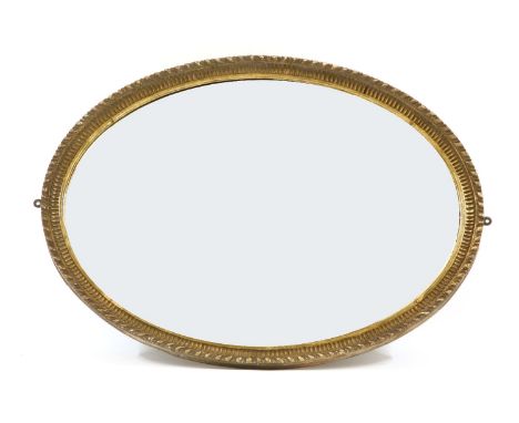 An early 20th century oval gilt framed wall mirror, with bevelled plate, 100cm x 70cm