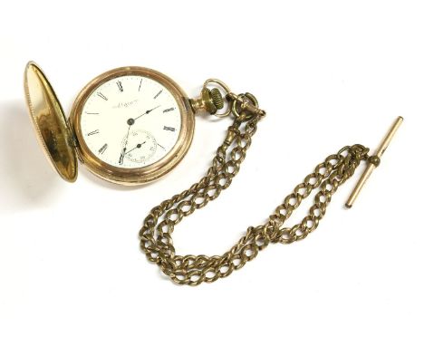 A rolled gold Hunter pocket watch, a white enamel dial signed Elgin, with Roman numerals and subsidiary seconds dial, with a 