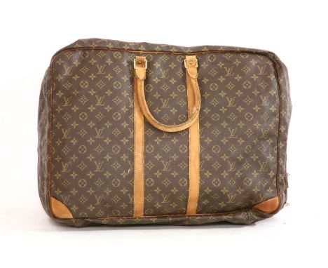A Louis Vuitton vintage 'Sirius 55' monogrammed leather suitcase, with a smooth vachetta cowhide tan leather trim, monogram c