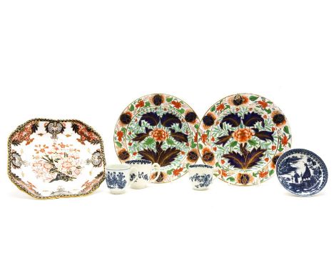 Three Worcester blue and white cups, two with crescent marks, and a saucer, chips, together with a pair of Imari pattern plat