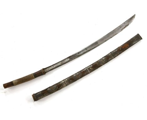 An Oriental ceremonial sword, with copper and shagreen handle, the hardwood scabbard embellished with white metal mounts, len