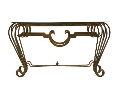 A wrought iron console table, with glass top over scrolling supports, united by stretchers, 140cm wide, 60cm deep, 82cm high