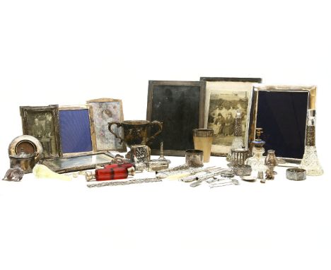 A group of silver and silver plate items, to include a Sampson Mordan propelling pencil, button hooks and photograph frames